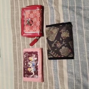 3 wallet set. Heart wallet, Disney Princess wallet, and Hello Kitty wallet.